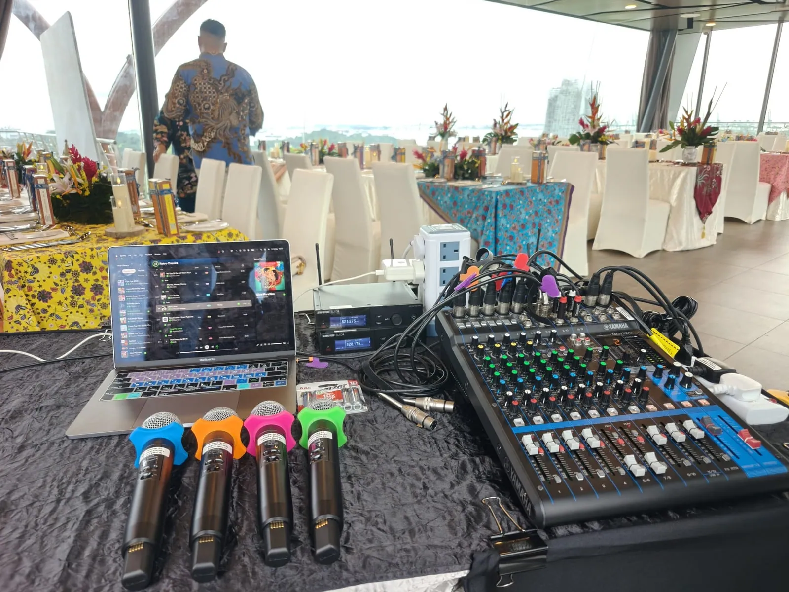 Mixer, wireless receivers and handheld microphones set up for an event by BounceParkSG