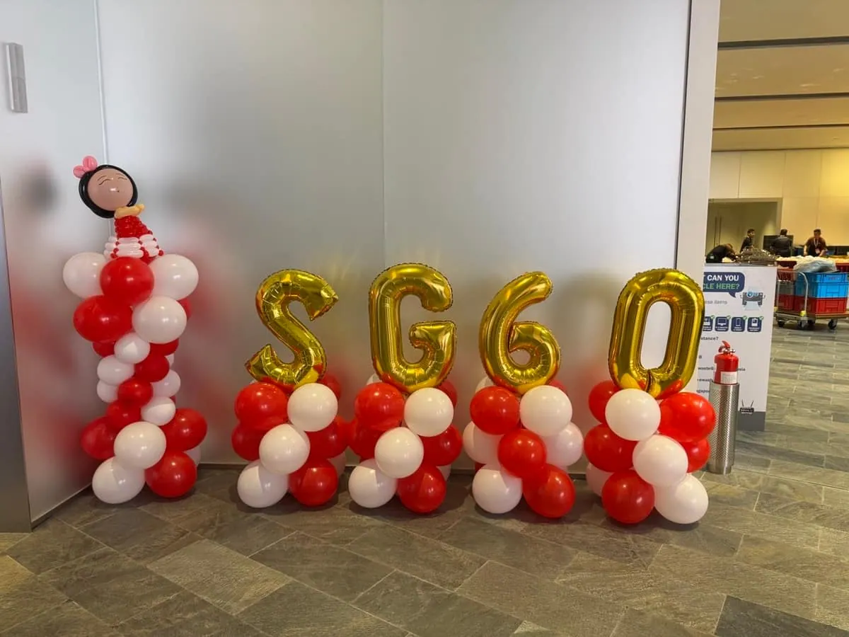 SG60 gold letter balloon decor at an event by BounceParkSG