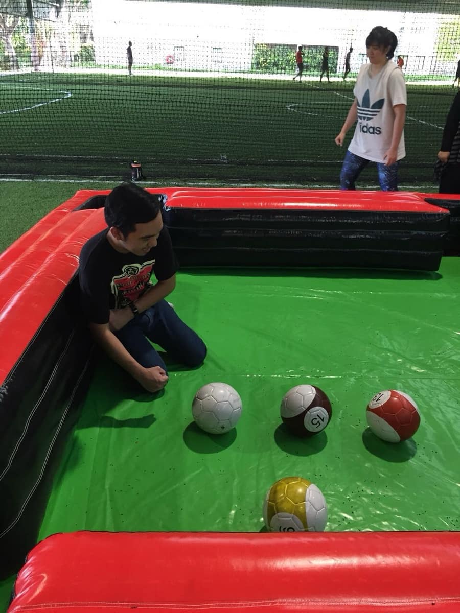 Giant inflatable snooker set up on turf