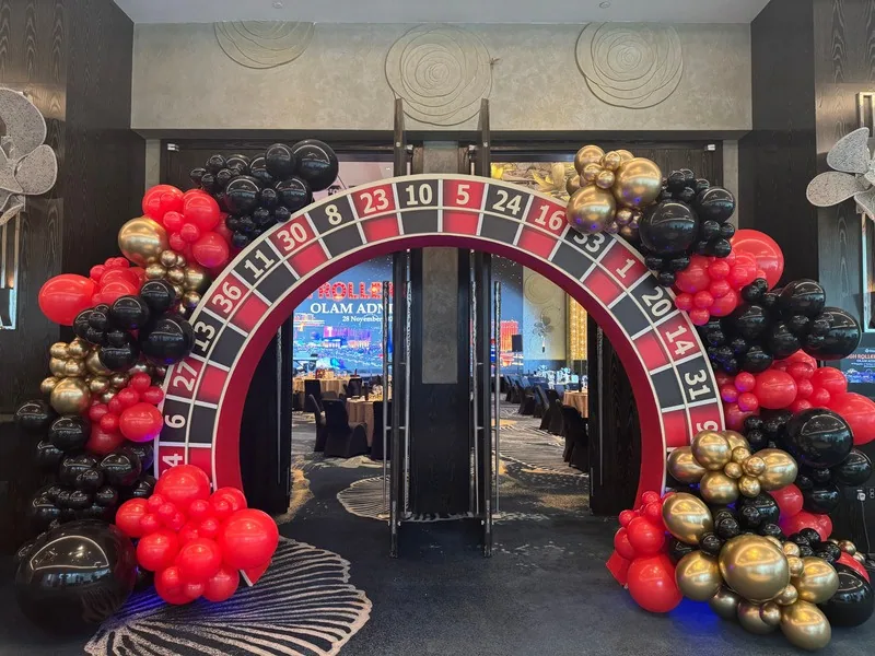 Roulette wheel balloon arch built by BounceParkSG