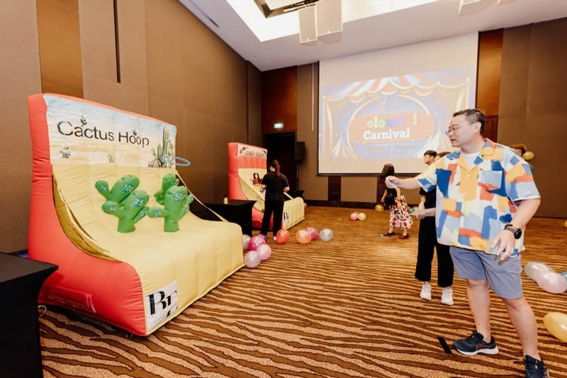 A carnival game set up in a ballroom