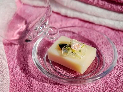 A handmade soap with a flower set in it