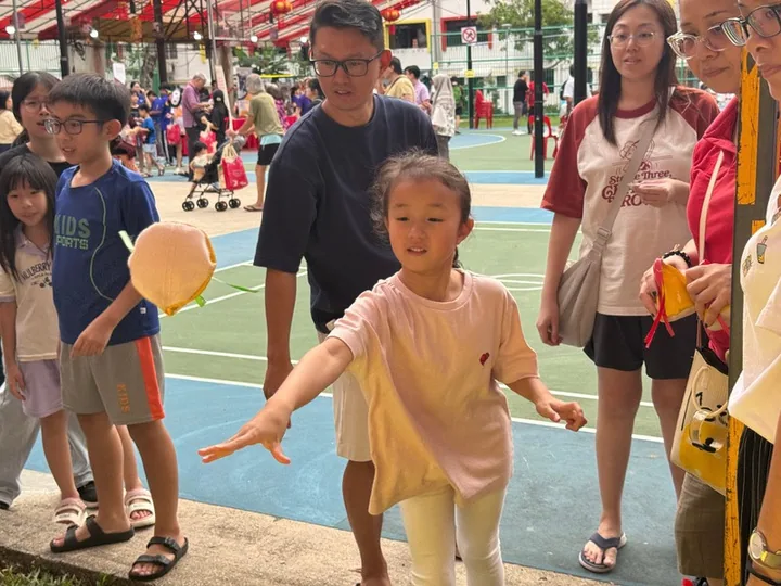 Guests playing an inflatable game