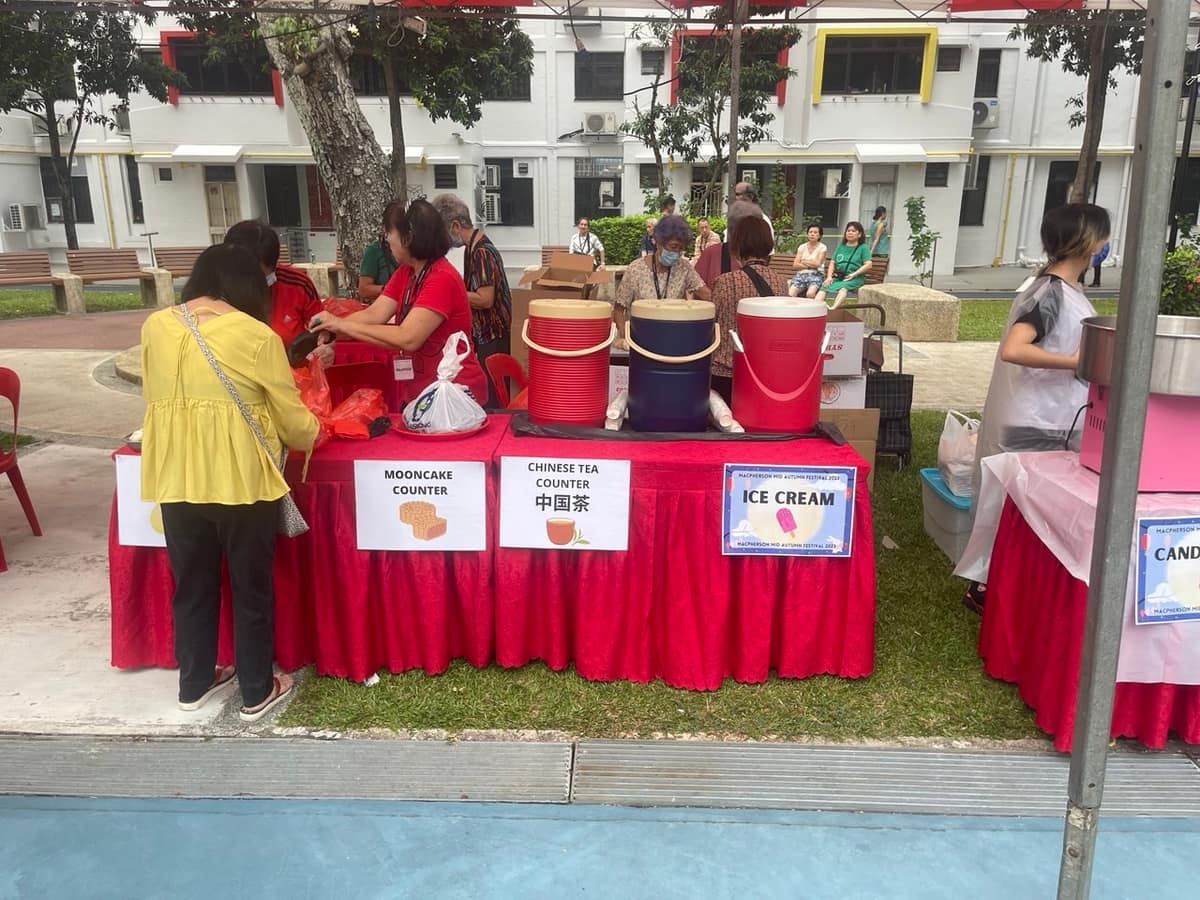 Students at carnival game booths