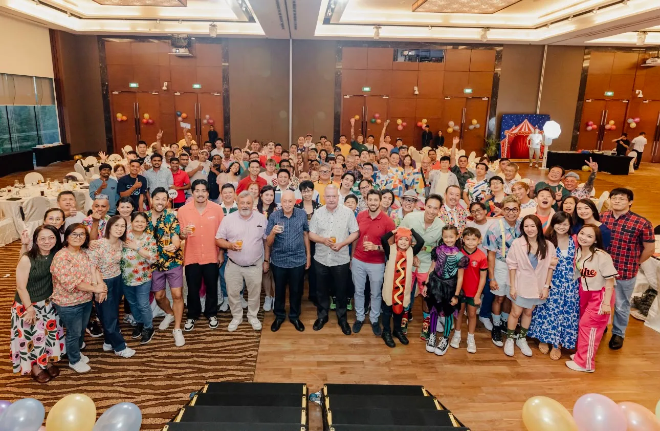 Guests and the emcee at a corporate dinner and dance hosted by BounceParkSG